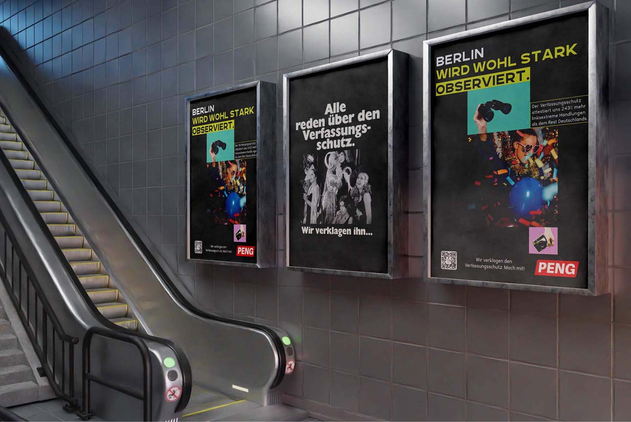 two posters for a Peng collective campaign, displayed in a subway station